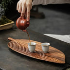 Close-up of leaf texture on wooden tray