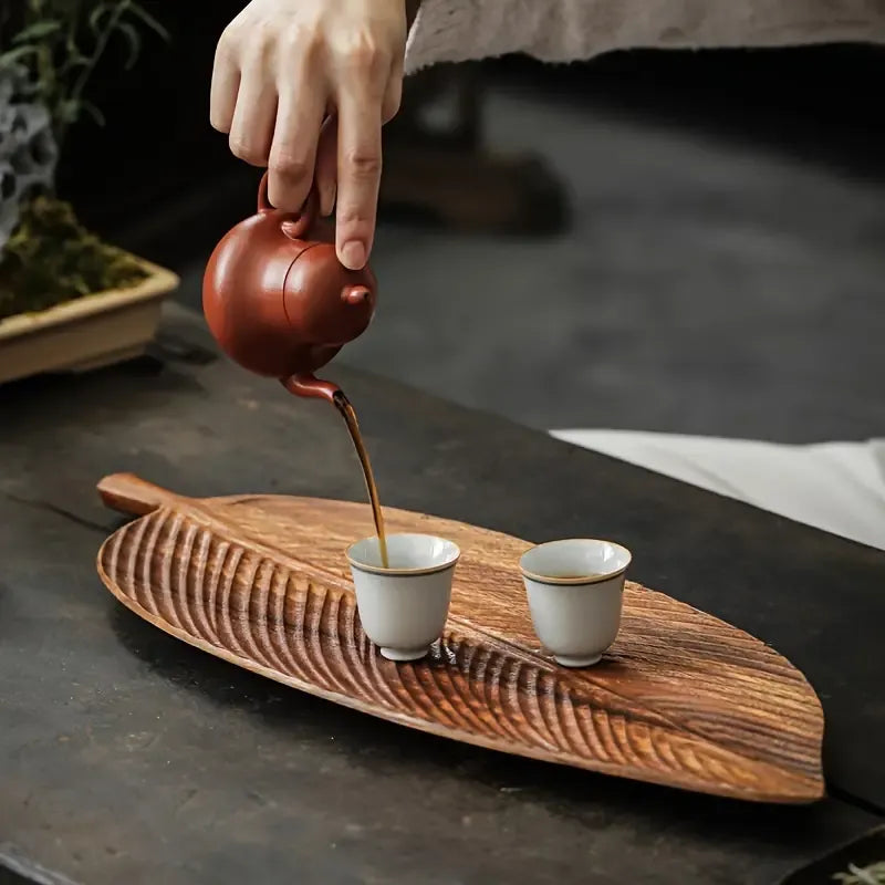 Close-up of leaf texture on wooden tray